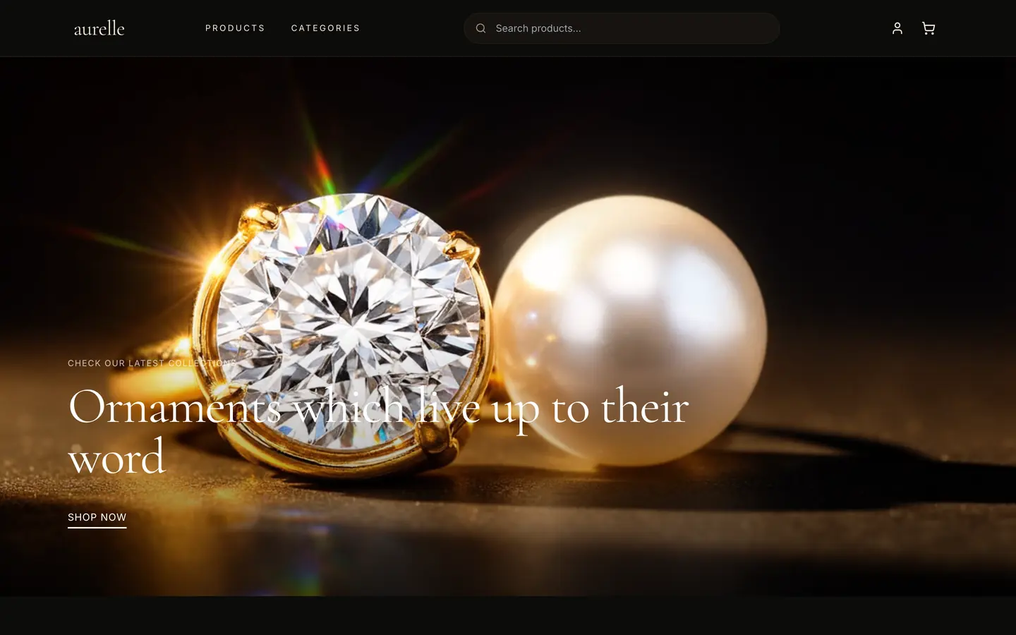 Aurelle storefront homepage — a diamond ring and pearl photographed on a dark surface, with the headline Ornaments which live up to their word
